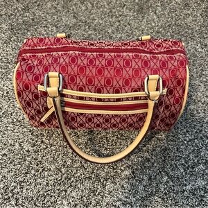 Red checkered Xoxo bowler bag.